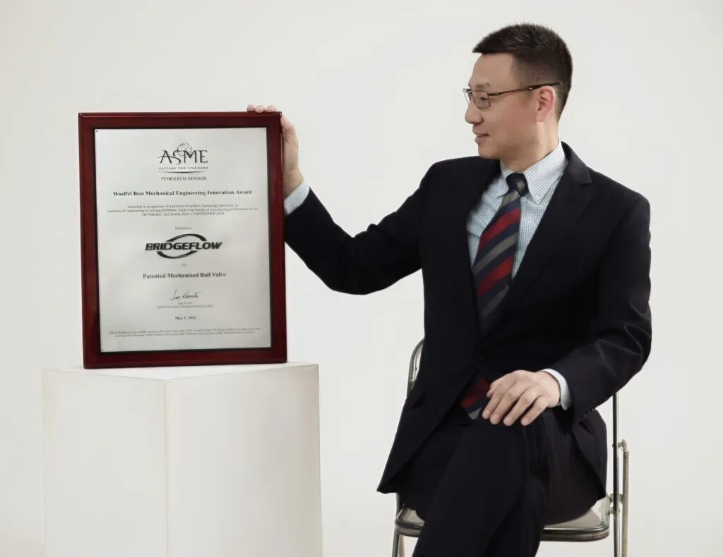 Peter Liu with BridgeFlow’s 2024 ASME BMEA award plaque